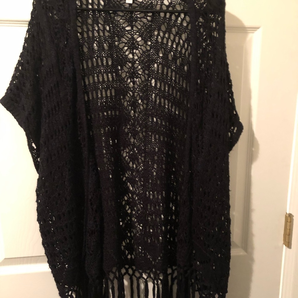 Crochet cardigan with fringe tassels at base